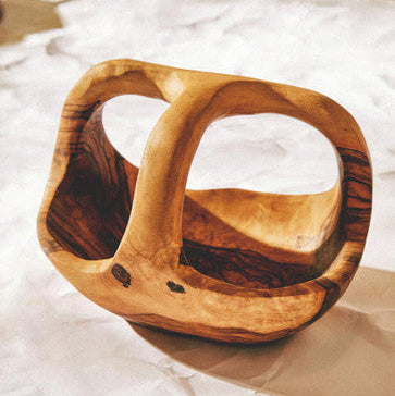 Handcrafted kora olive wood fruit bowl with smooth natural curves and warm golden brown finish wood fruit bowl