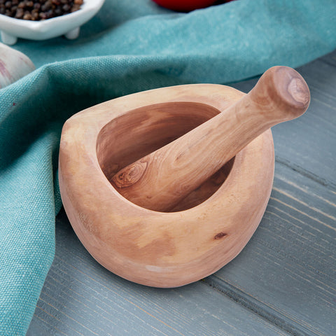 Kora olive wood mortar and pestle set with smooth light brown wood mortar and matching rounded bowl and handle