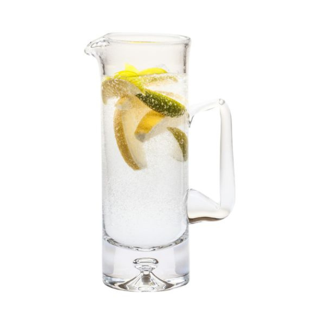 Clear glass krosno water jug 1ltr with handle filled with sparkling water and lemon lime slices
