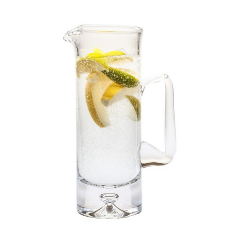 Clear glass krosno water jug 1ltr with handle filled with sparkling water and lemon lime slices