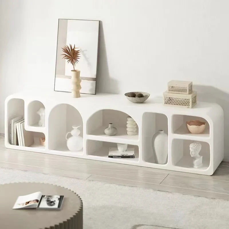 White modern media console kure cabinet with arched cutouts and minimalist design for stylish storage
