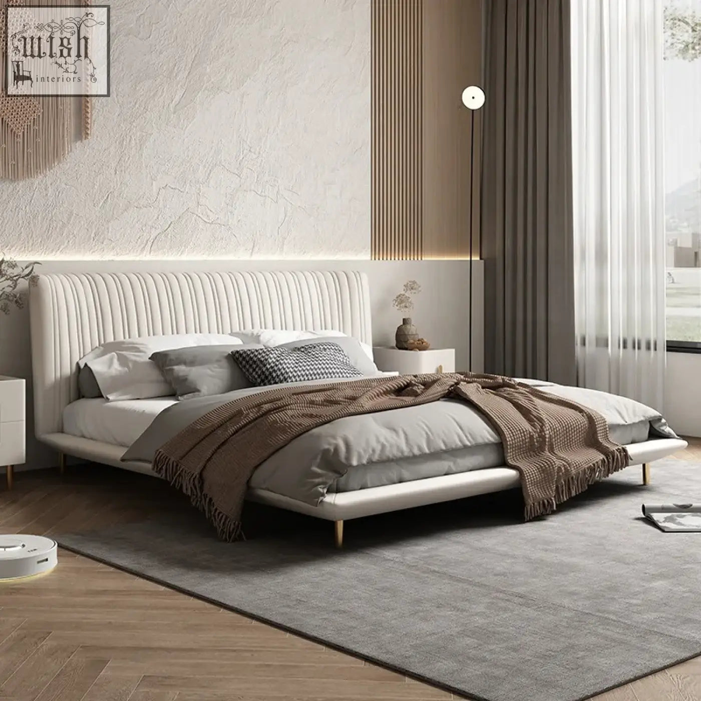 Modern white upholstered kuri bed with ribbed vertical channelling headboard and chic comfort gold-tone legs