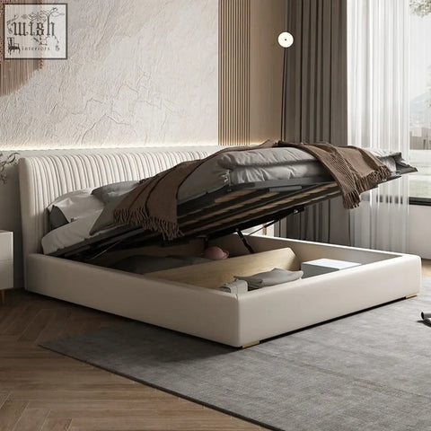 Cream-colored kuri bed with tufted headboard and lift-up storage base offering chic comfort and vertical channelling