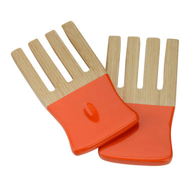 Bright orange kyoto orange salad hand servers with light wood handles and a smooth glossy finish