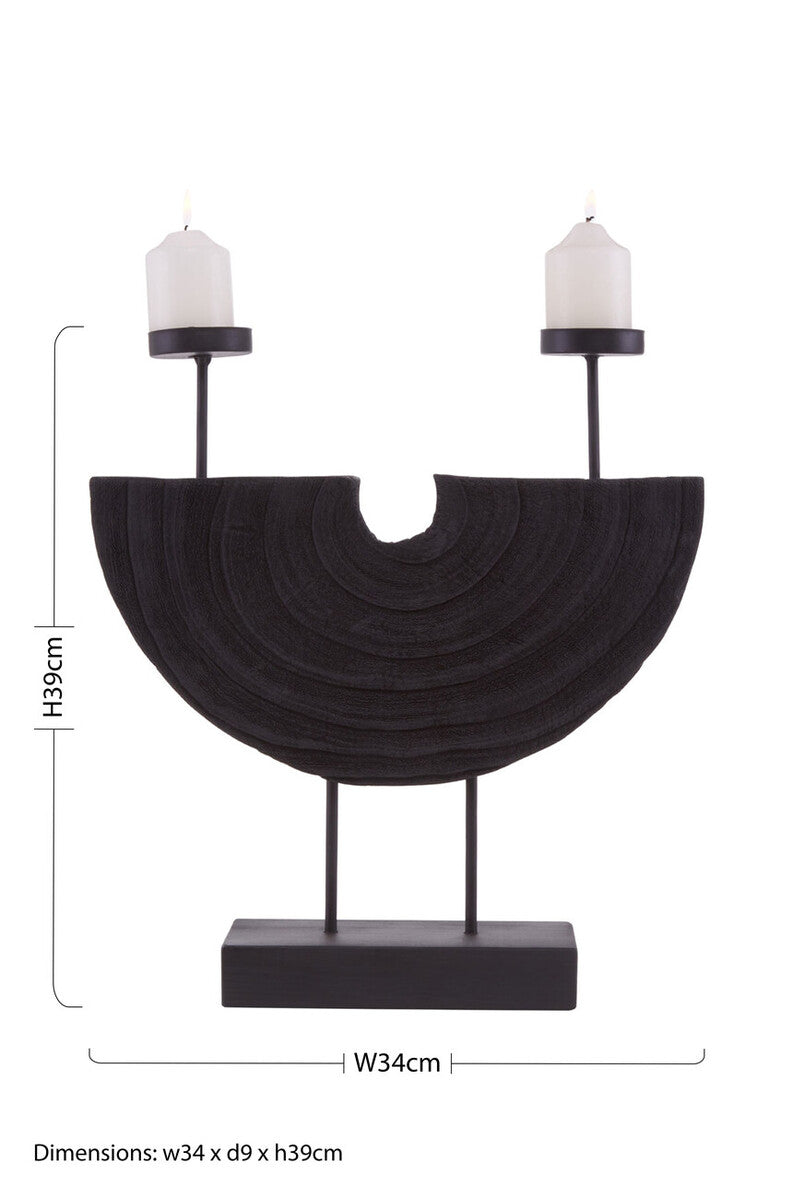 Black textured semi-circular lacuna two candle holder with two slender arms holding white candles
