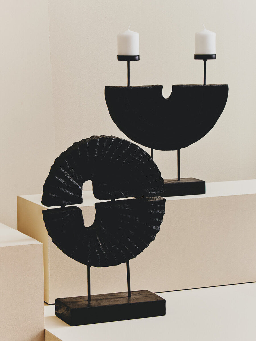 Lacuna two candle holder with black semi-circular textured fan-like surfaces on sleek metal stands for two candle use