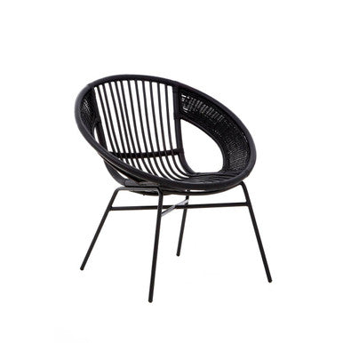 Lagom black natural woven wicker chair with rounded cozy design and slender iron black legs for stylish seating