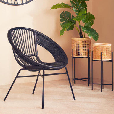 Black natural rattan lagom black natural chair with slender iron black legs perfect for modern seating