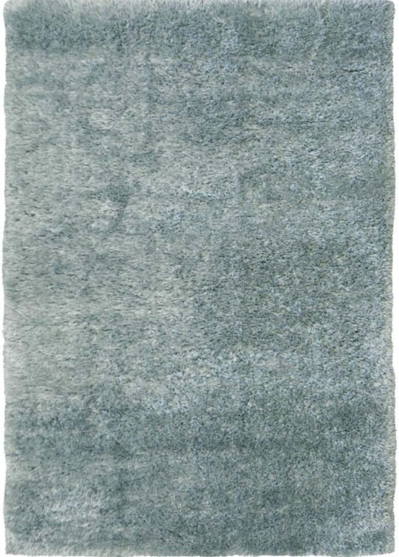 A plush shaggy area rug in soft duck egg blue with a dense uniform pile perfect for cozy living spaces