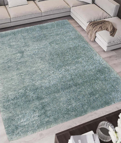 A plush lagom shaggy rug in soft duck egg blue with a textured, shag surface perfect for cozy spaces