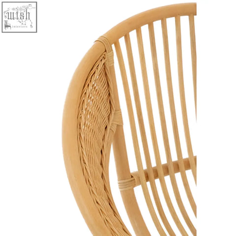 Lagom natural rattan black iron chair with natural-toned woven curved backrest and vertical slats