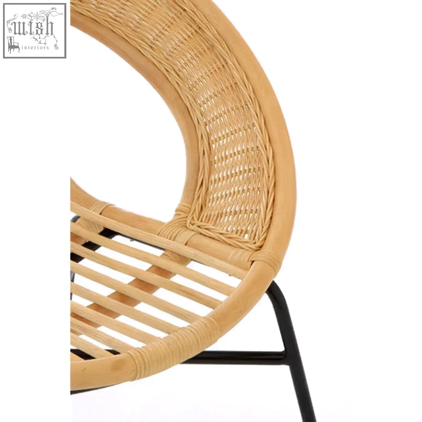Lagom natural rattan chair with curved back and black iron legs for stylish and comfy seating