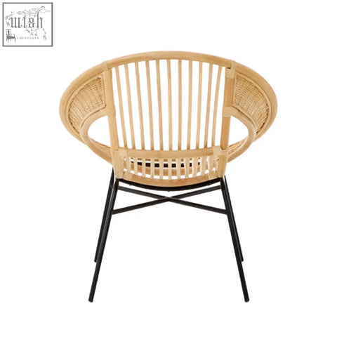 Lagom natural rattan chair with black iron legs featuring a stylish and durable black iron chair design