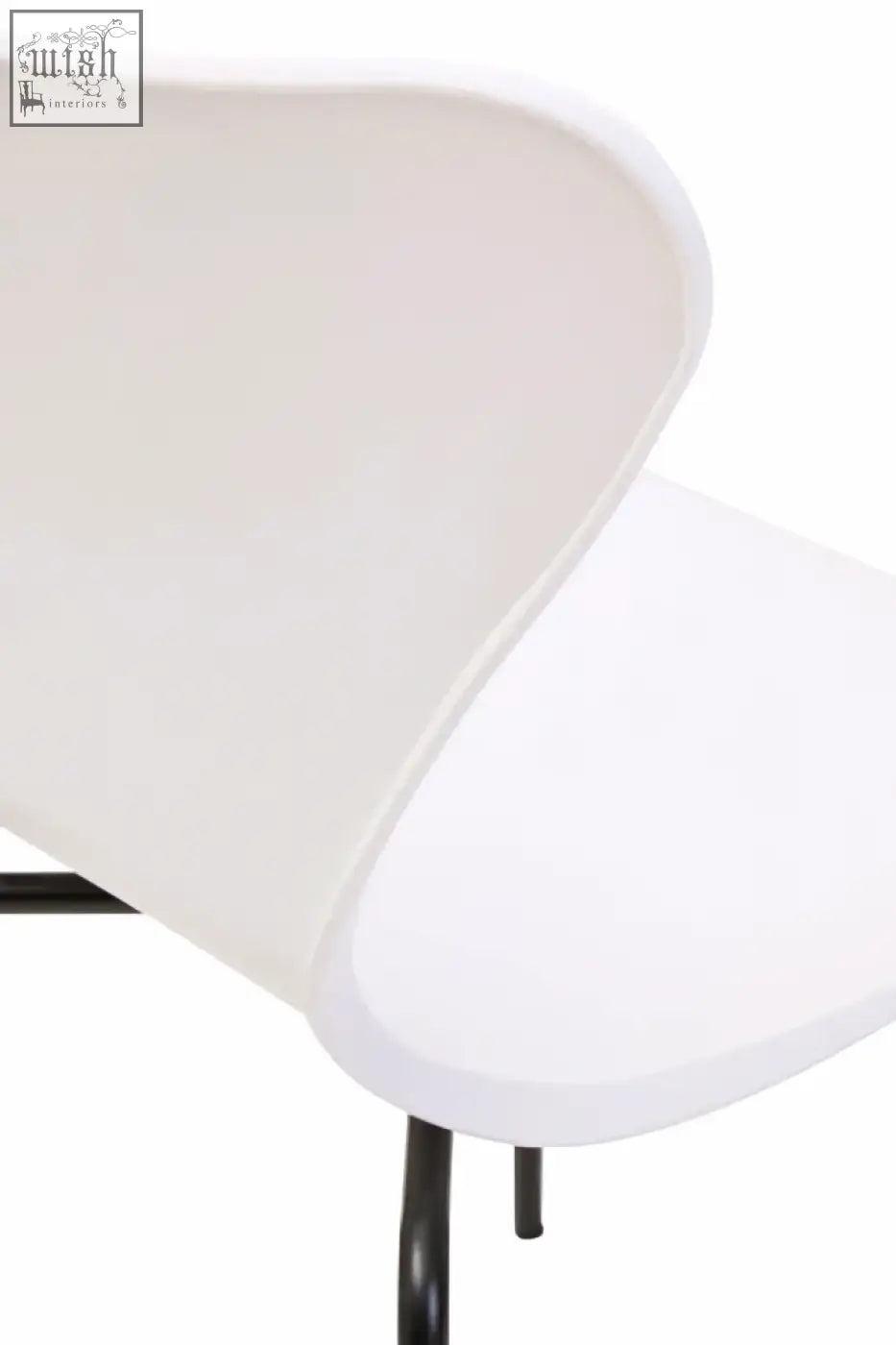 Laila white seat dining chair with white undulating molded plastic and sleek black angular legs