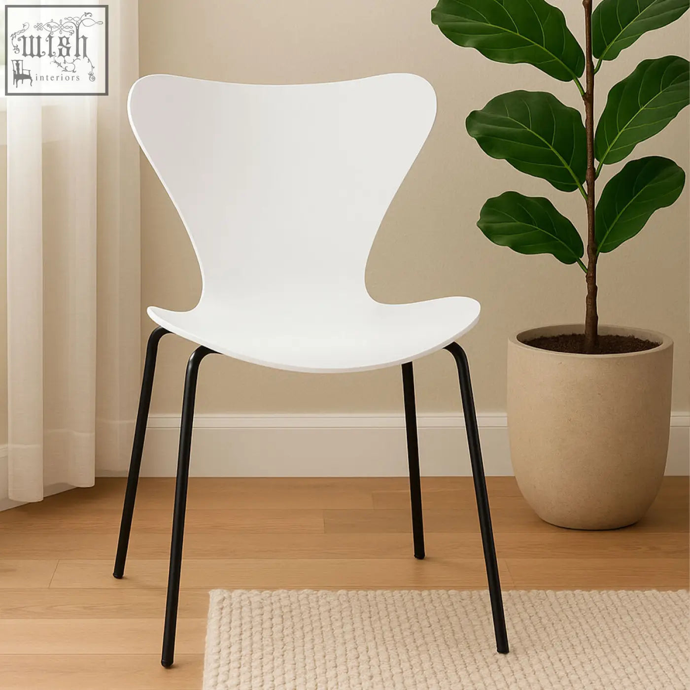 White molded plastic dining chair with white undulating seat and black angular legs for modern dining room