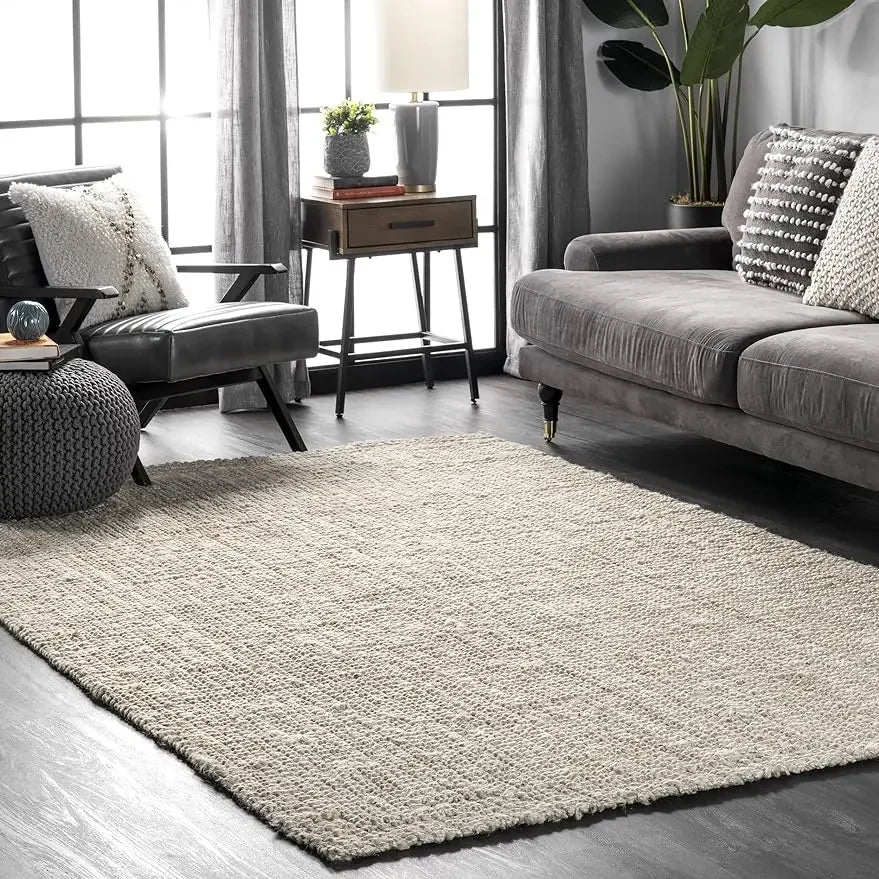 Beige lamion rug with plush looped pile and slightly frayed edges perfect for cozy living spaces