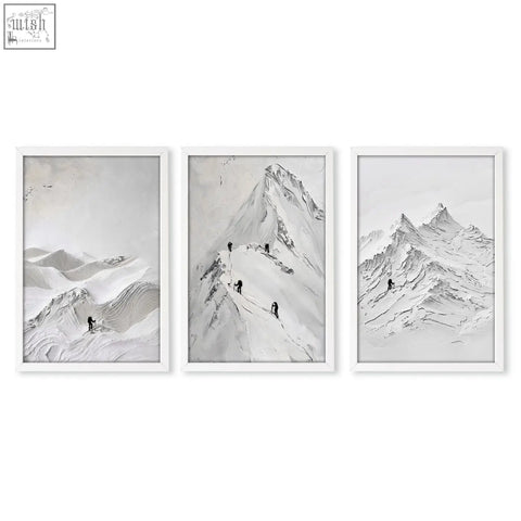 Set of 3 black and white mountain climbing art prints in minimalist white frames perfect for landscape wall art