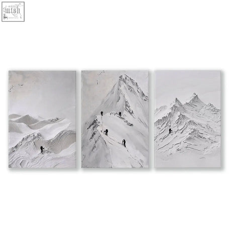Three-panel minimalist landscape art wall art featuring textured white and grey snowscapes with silhouetted climbers