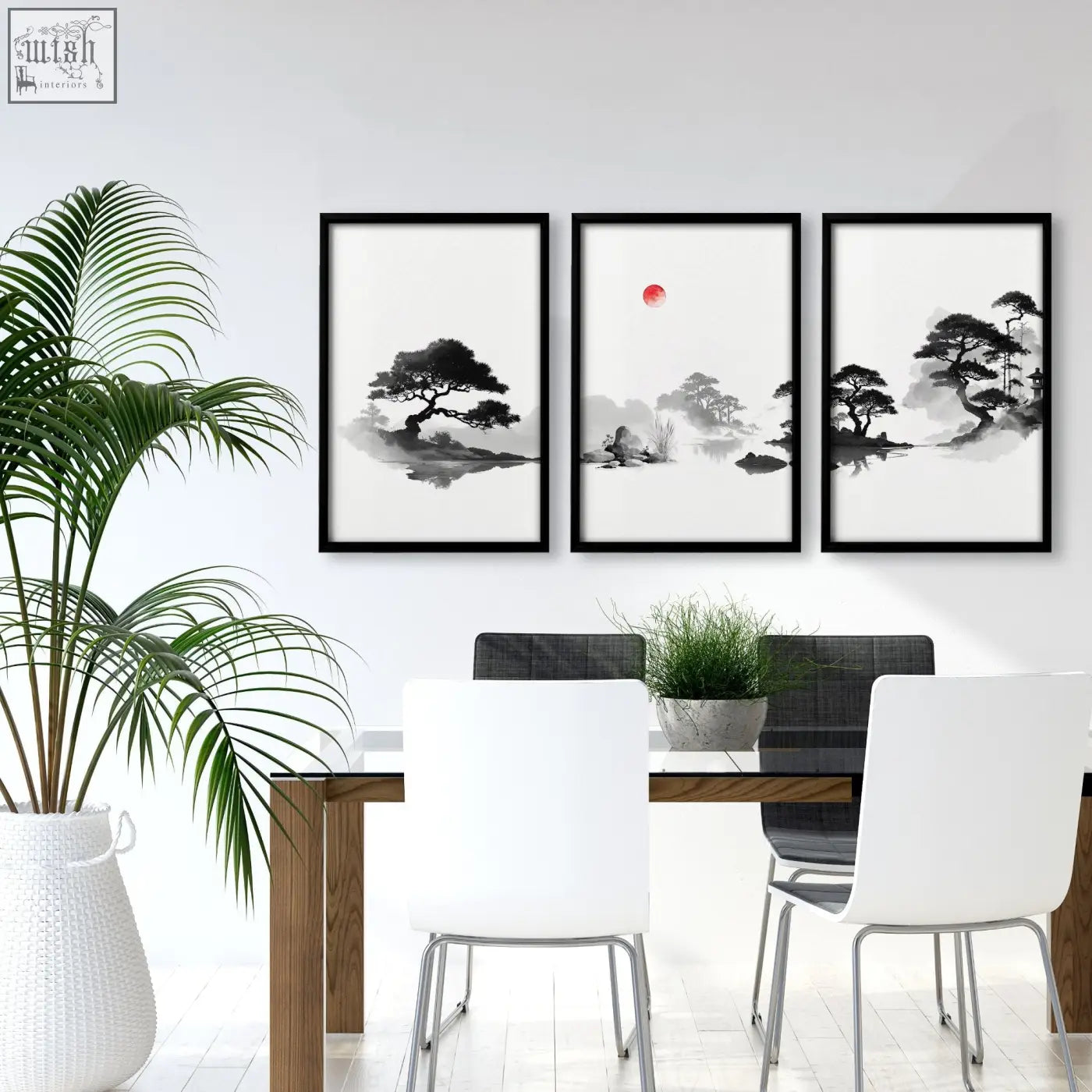 Three black-framed japanese ink zen bonsai landscape art paintings with red sun displayed above a dining room table