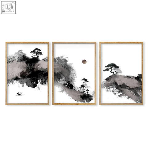 Set of three minimalist japanese ink wash landscape prints in light wood frames featuring black white and maroon tones