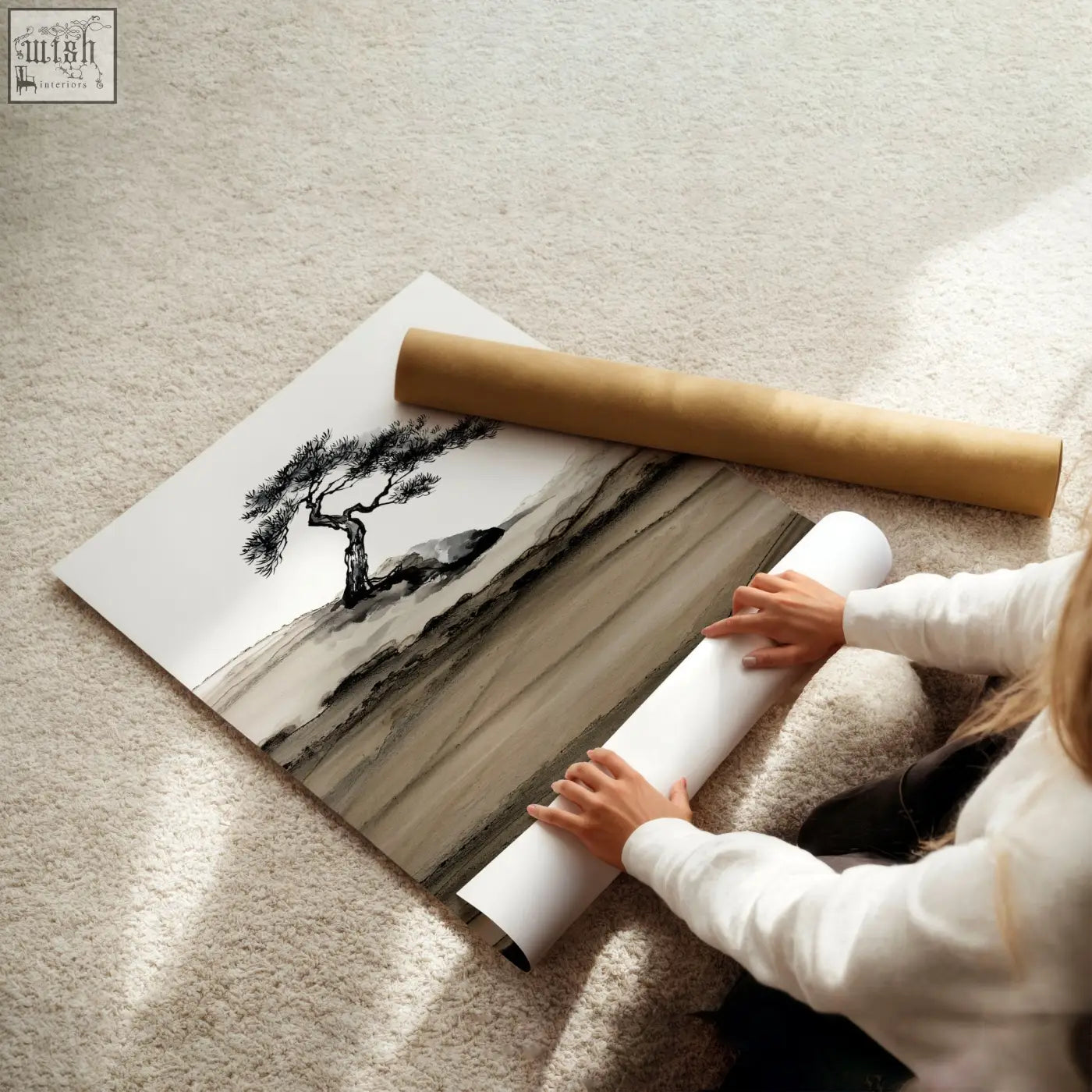 A minimalist black and white japanese ink landscape print of a pine tree on textured paper with brown tones tube