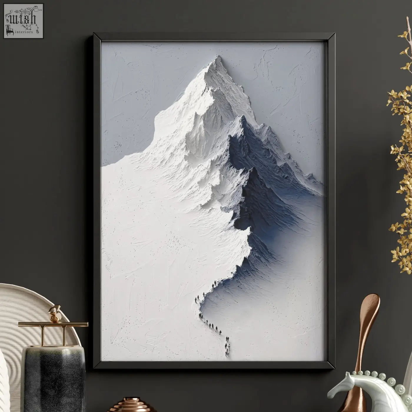 A framed landscape wall art featuring a majestic snow-capped mountain with climbers in a nordic winter forest set