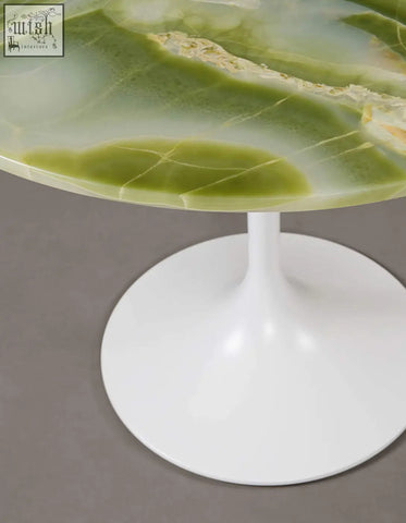 Langenfeld round dining table with sleek green onyx top and white tulip marble base perfect for round dining