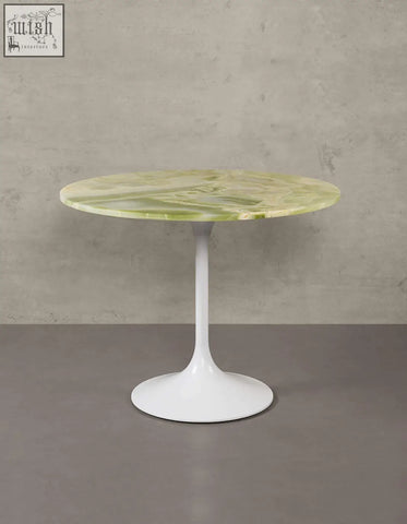 Langenfeld round dining table with a sleek green marble top and minimalist white pedestal base for round dining