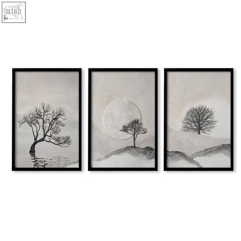 Set of three black-framed minimalist wall art prints featuring monochrome tree silhouettes for living room decor