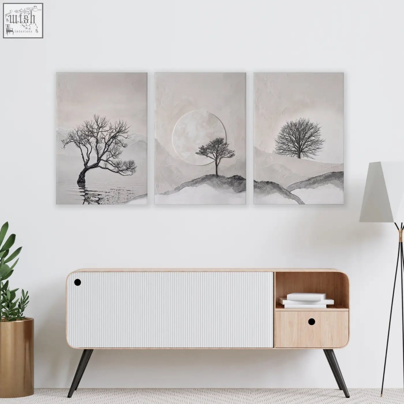Set of 3 black and white canvas wall art featuring minimalist trees for living room above wooden console table