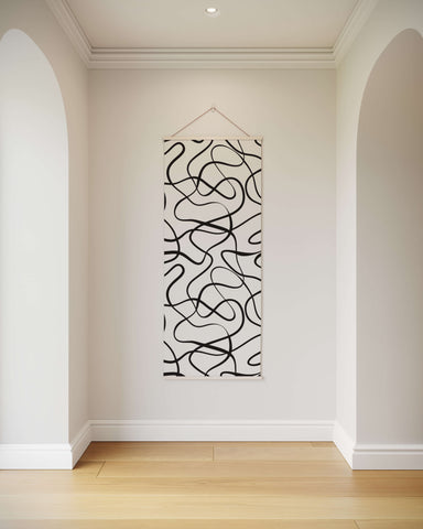 Black abstract wavy line tapestry hanging on a white wall large abstract wavy line art for home decor