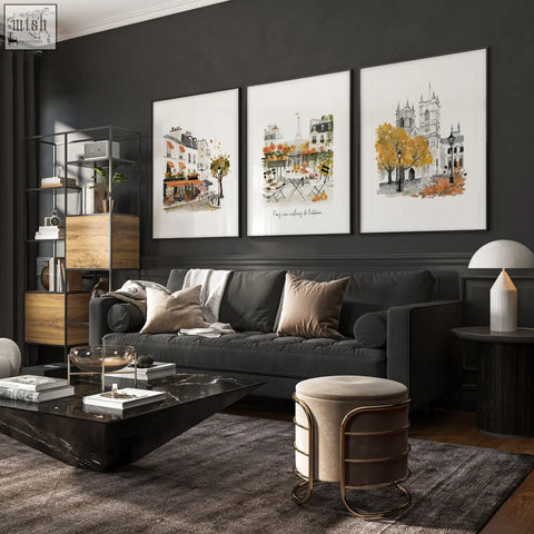 Black marble coffee table with glossy finish and geometric design complements large artwork autumn paris watercolour living room