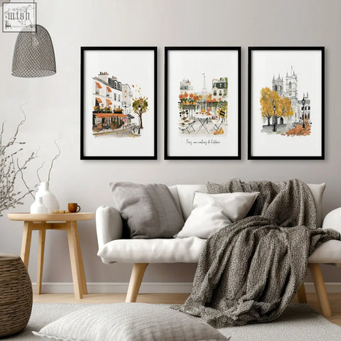 Three framed large artwork prints of autumn paris watercolour scenes in black frames perfect for living room decor