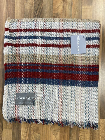 A cozy large checked random recycled wool blanket with a classic plaid pattern in rich reds and blues