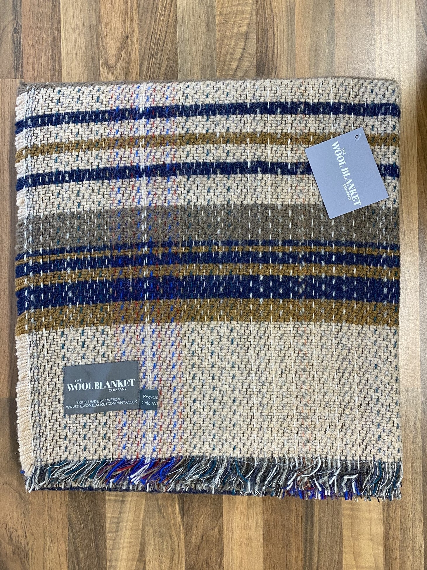 Large checked random recycled wool blanket with cozy handwoven plaid in beige navy blue olive green and purple tones
