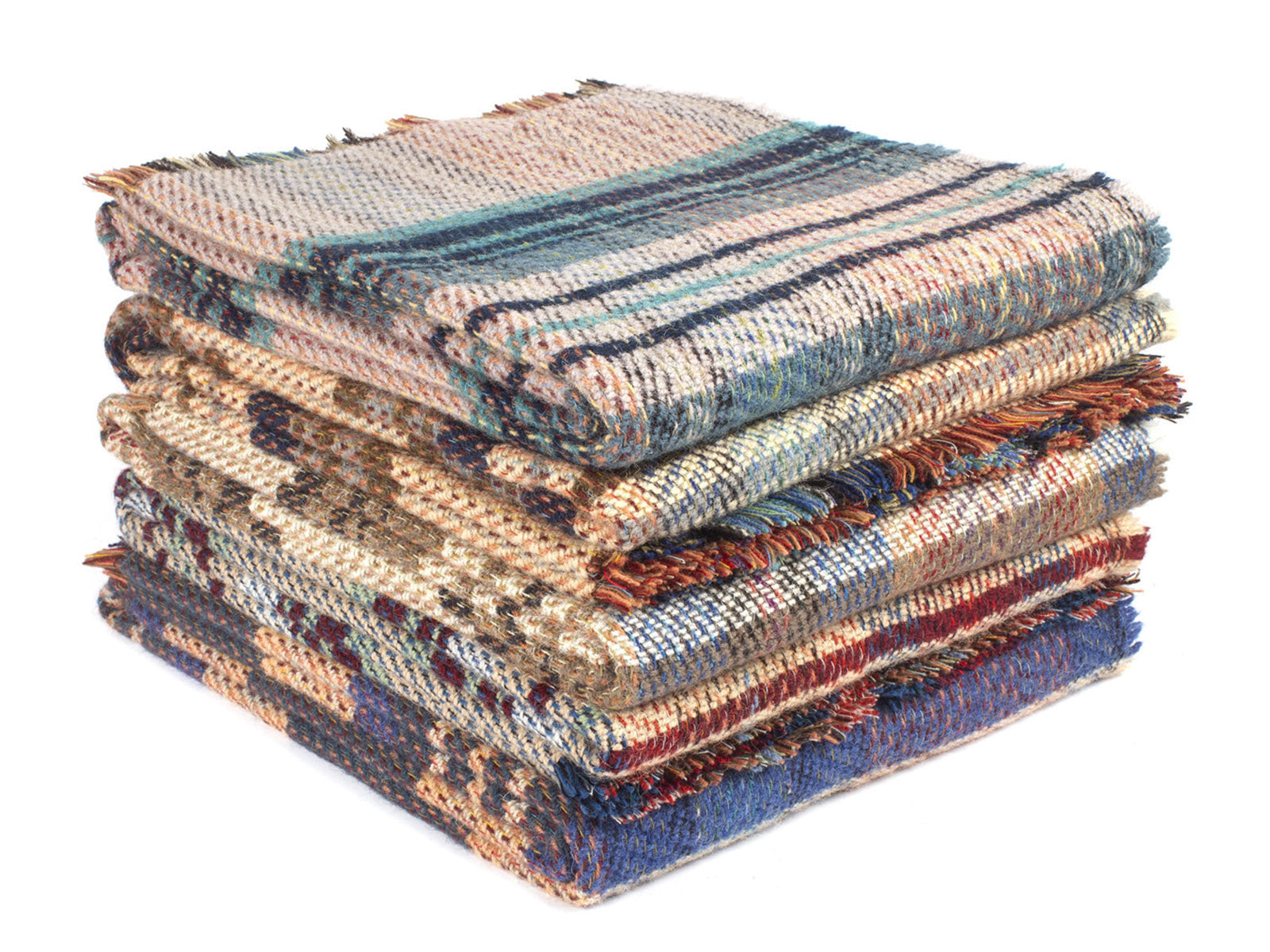 Stack of large checked random recycled wool throw blankets with frayed edges and earthy multicolored stripes