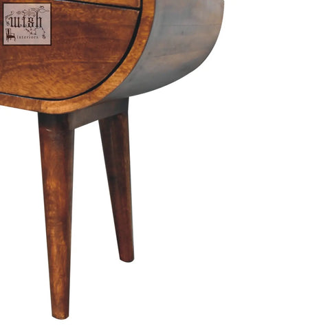 Large chestnut circular wooden bedside table with mid-century modern design dark brown finish and tapered legs