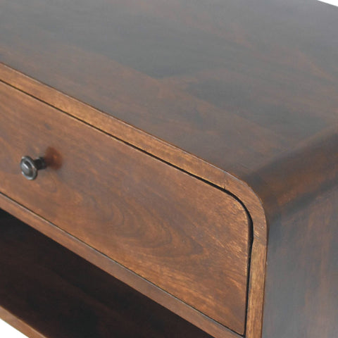 Large chestnut curve floating bedside table in dark brown wood with a curved drawer and black metal knob