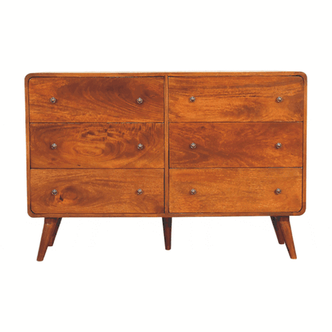 Large curved chestnut finish wooden dresser with six drawers and tapered legs in a rounded form factor