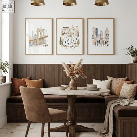Marble-top round dining table with dark wood base paired with large dining room wall art winter in new york prints
