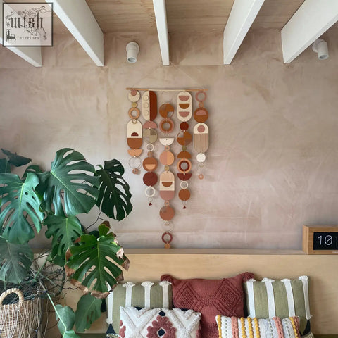 Large modern wall art with hand painted geometric shapes in warm terracotta beige and cream perfect for minimal home decor