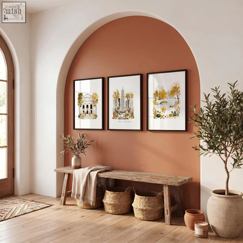 Three framed ochre botanical illustrations of manhattan scenes hang as york wall art above a rustic wooden bench