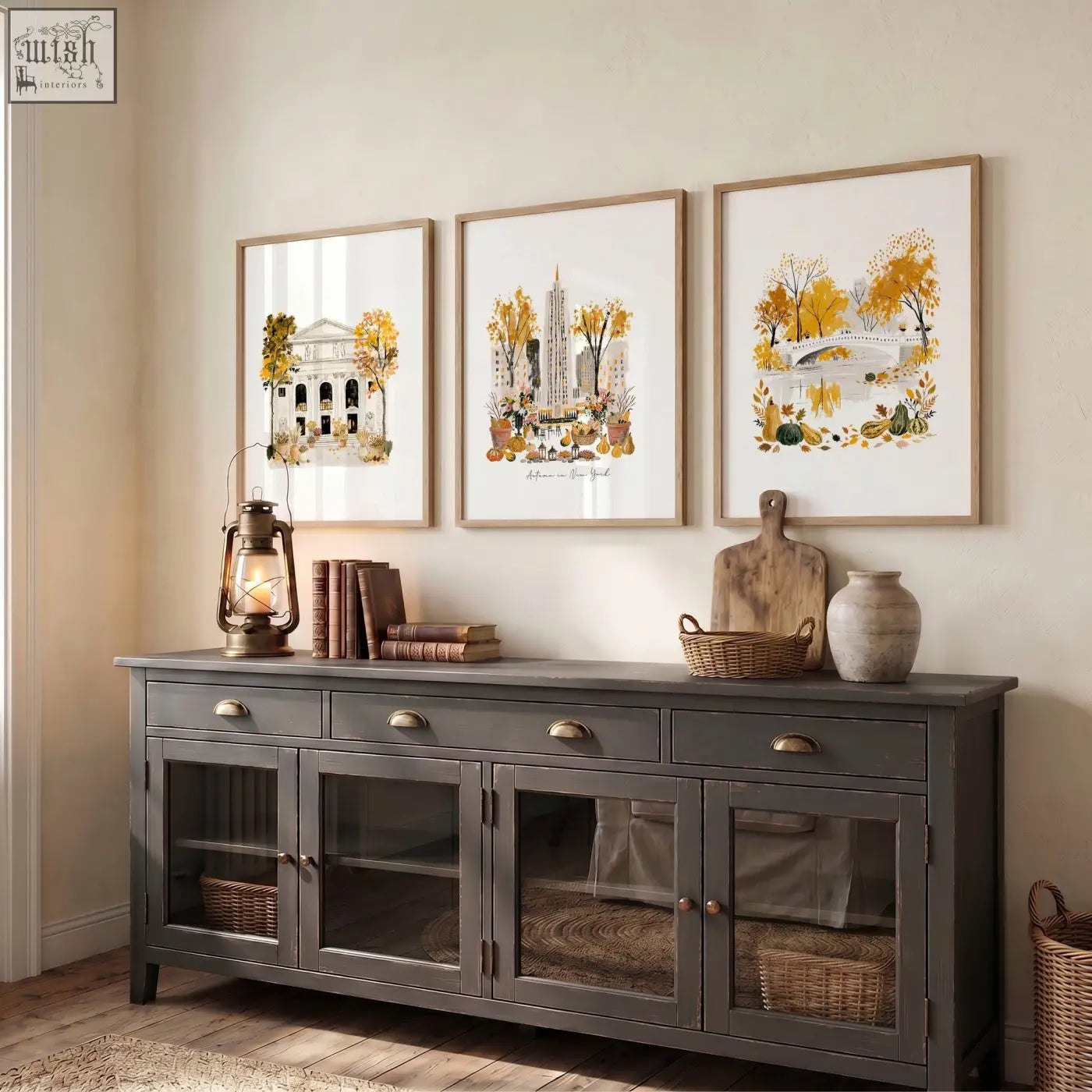 Dark gray wooden sideboard with glass-paneled doors and brass handles below large new york wall art autumn in new york set