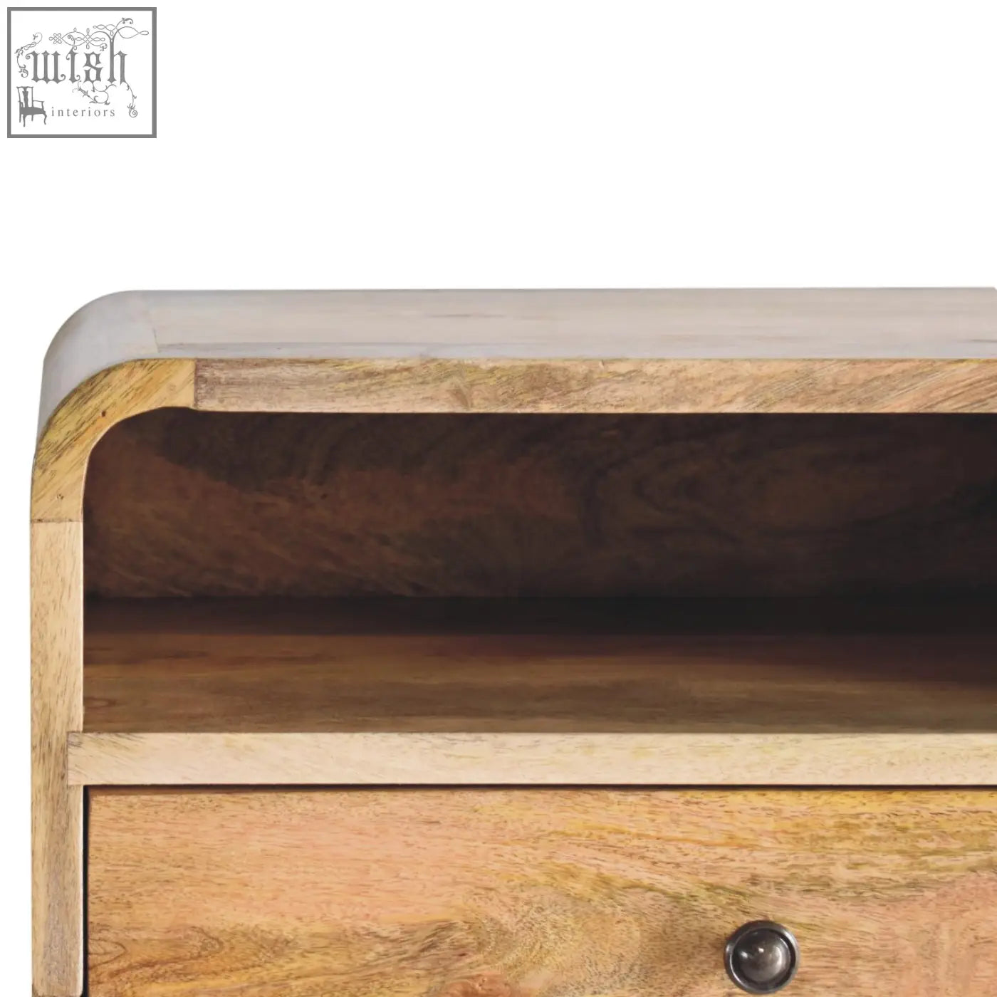 A rustic large oak-ish curve upper slot floating bedside table in light mango wood with natural grain patterns