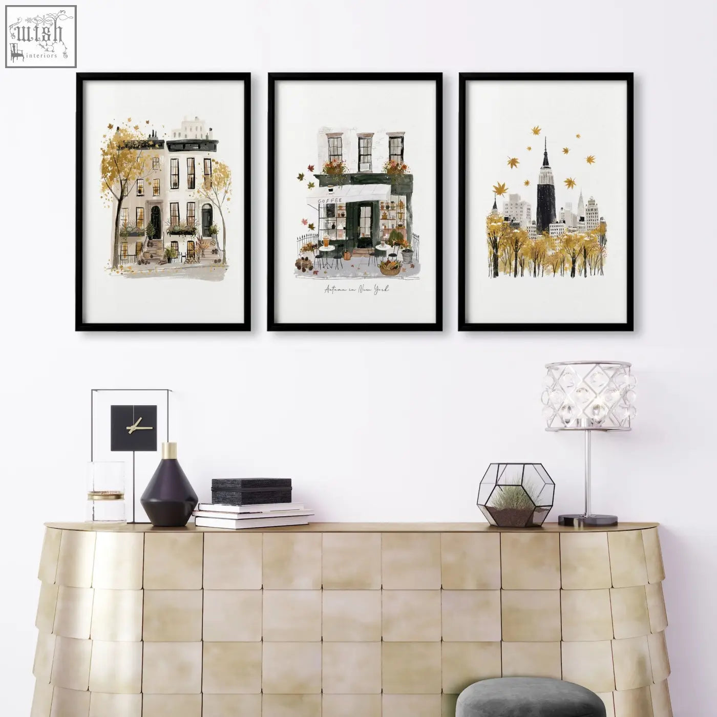 Three black-framed watercolor cityscape prints with golden foliage as living room wall art for autumn in new york