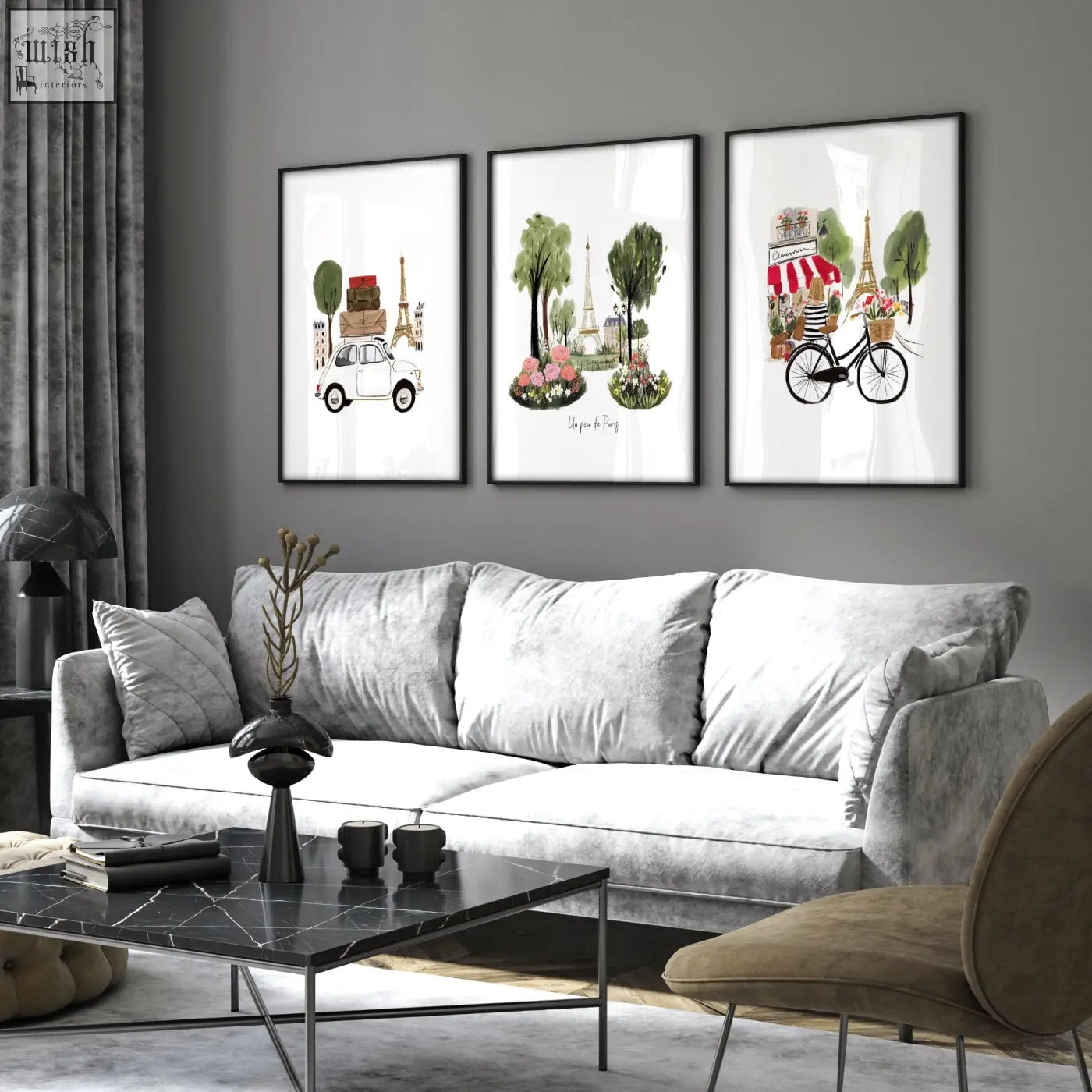 Three framed paris-themed travel wall art prints featuring eiffel tower hang above the living room sofa