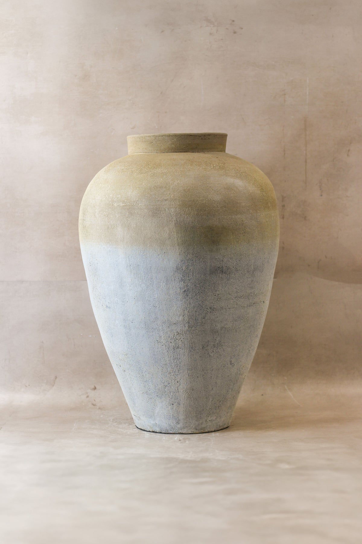 Large two tone neutral indonesian ceramic pot matte finish with pale beige to gray blue gradient and subtle texture