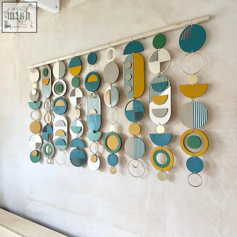 Large wall art wood decor with modern teal mustard yellow and gray geometric patterns for over the bed display