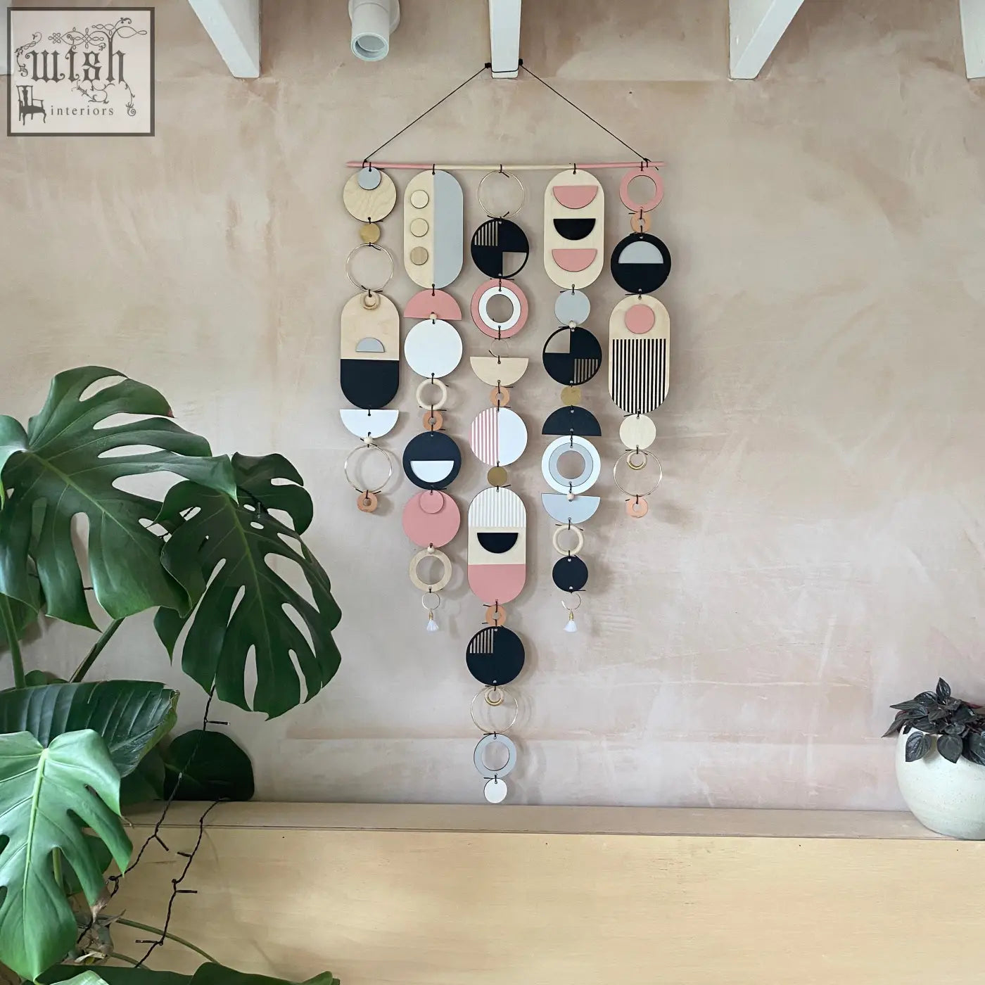 Large wall art featuring hand painted modern geometric shapes in pastel pink black white and beige for minimalist decor