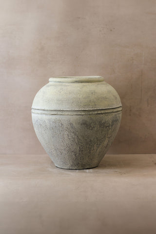 Large white rustic indonesian pot no 26 made of light gray matte ceramic with rounded body and subtle horizontal banding